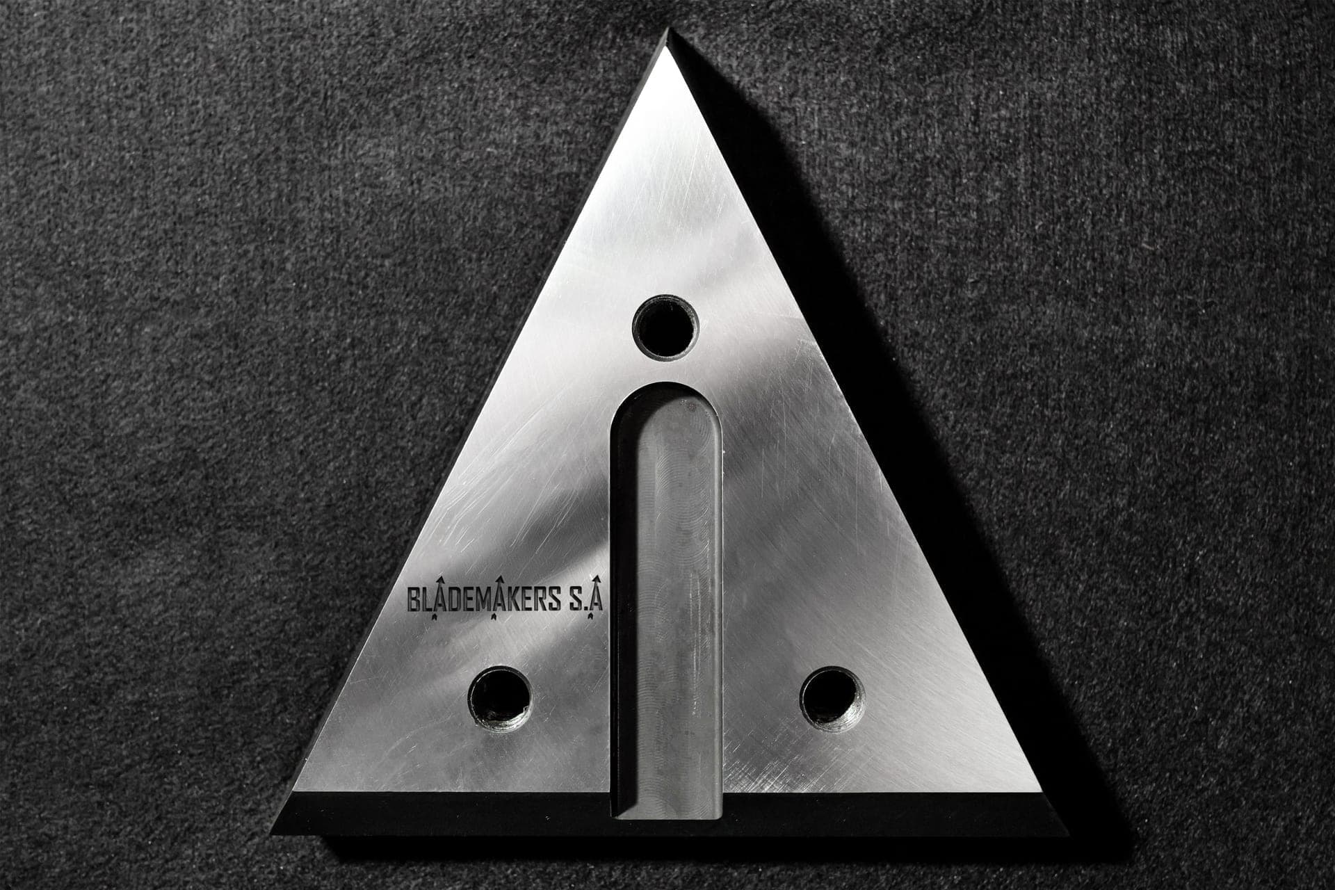 Triangular anvil wear part for chipper lines